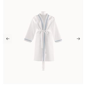 100% cotton Women's Classic white pique designed robe with sky blue trim.